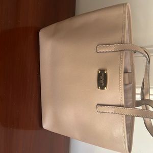 Michael Kors purse. Tan color. Very lightly used.